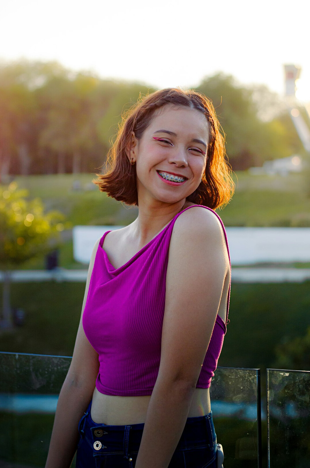 Portrait of a young woman with short hair smiling